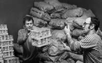 Miners stack food parcels