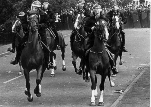 Mounted Police charge pickets